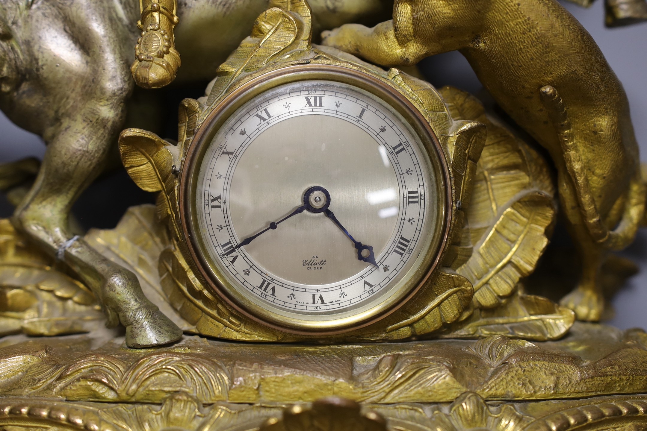 A 19th century spelter mantle clock with later Elliot dial and movement